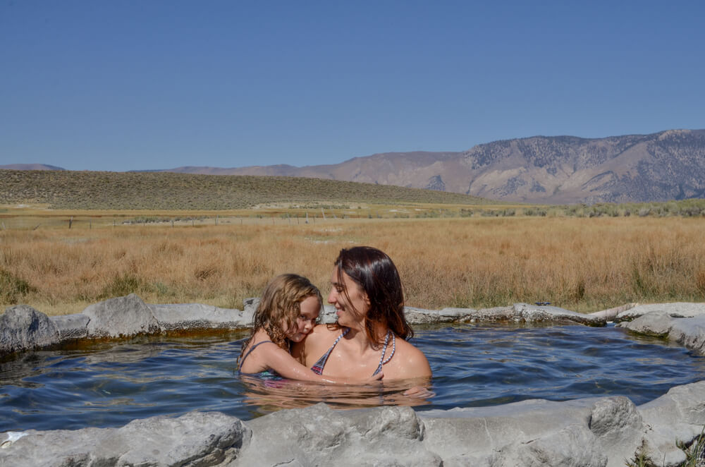 A mom and daughter in one of the Eastern Sierra hot springs.