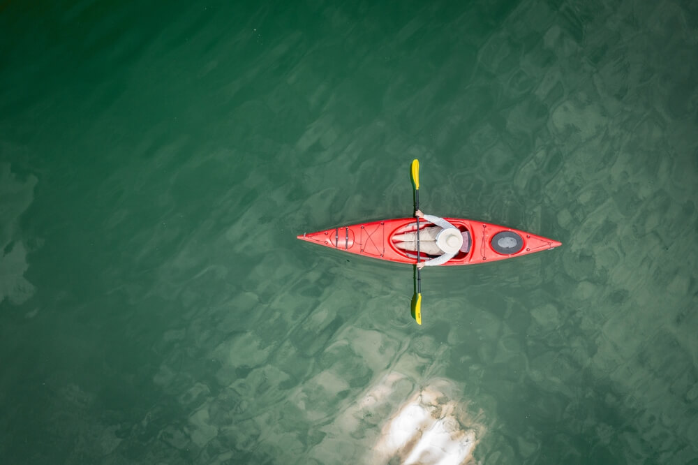 A person kayaking, one of the best things to do in June Lake.