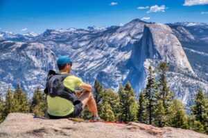 A man hiking, one of the best things to do in California near June Lake.